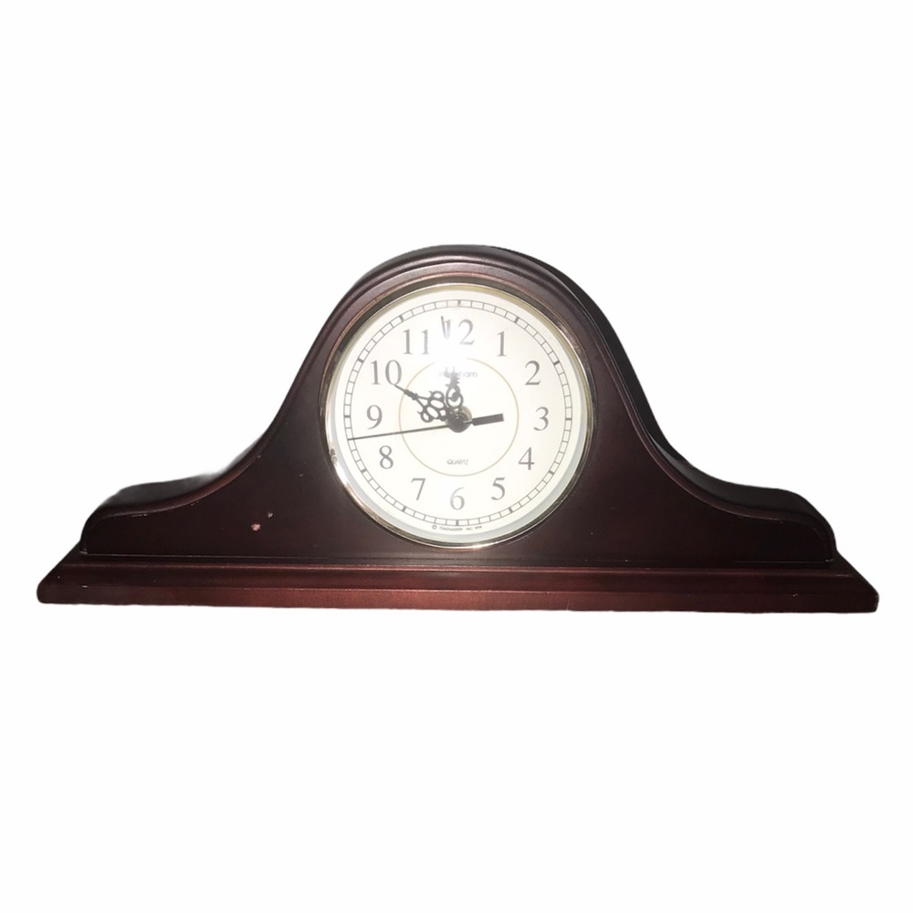 Old wooden home decor clock.